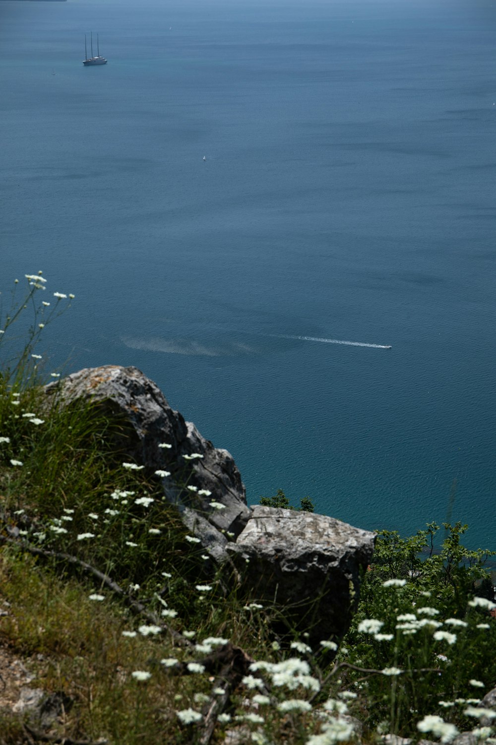 a view of a body of water with a boat in the distance