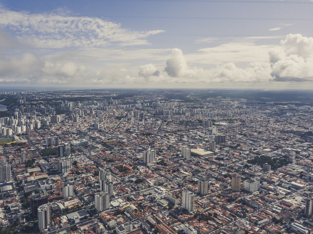 an aerial view of a city with tall buildings