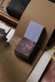 a piece of paper sitting on top of a wooden table