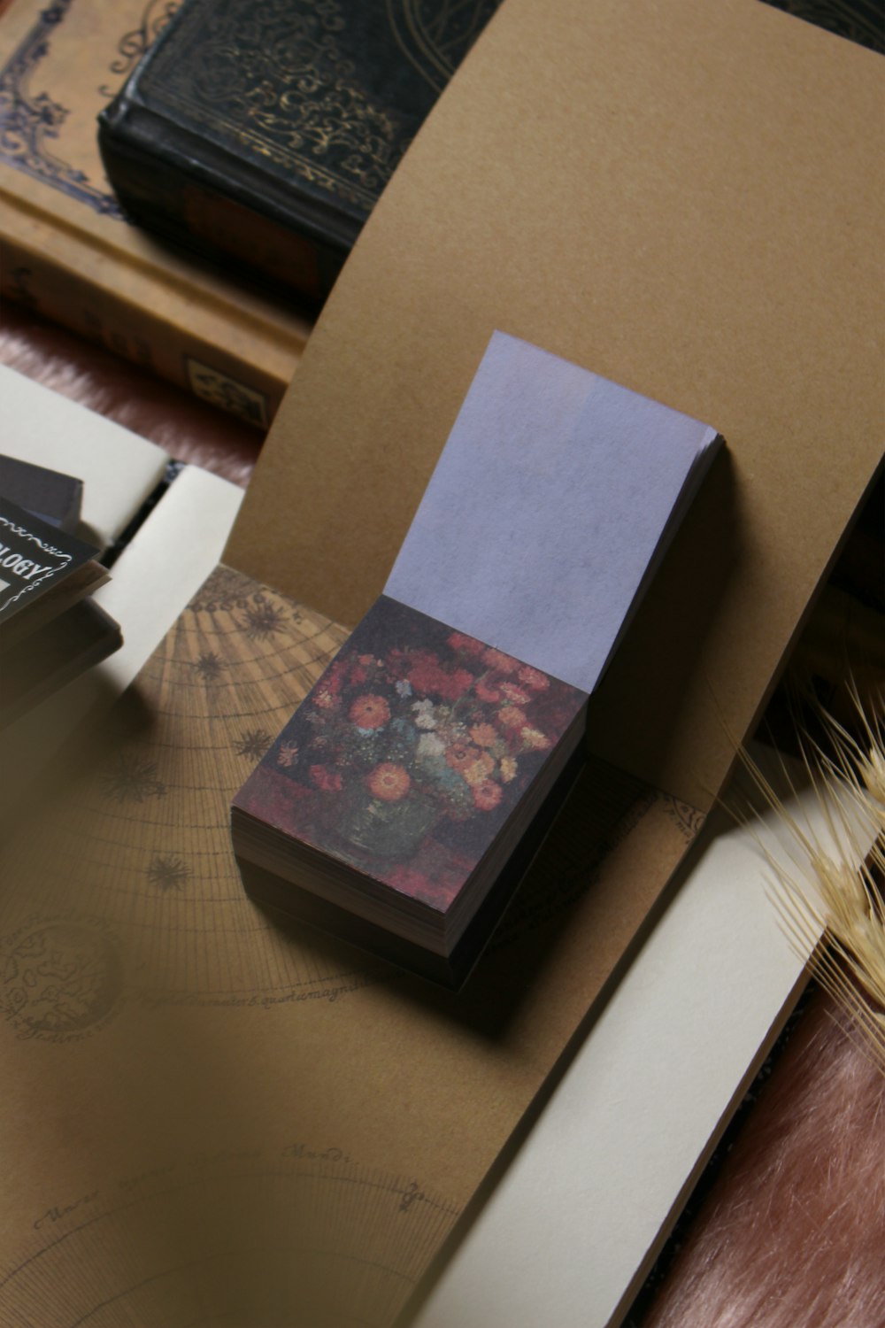 a piece of paper sitting on top of a wooden table