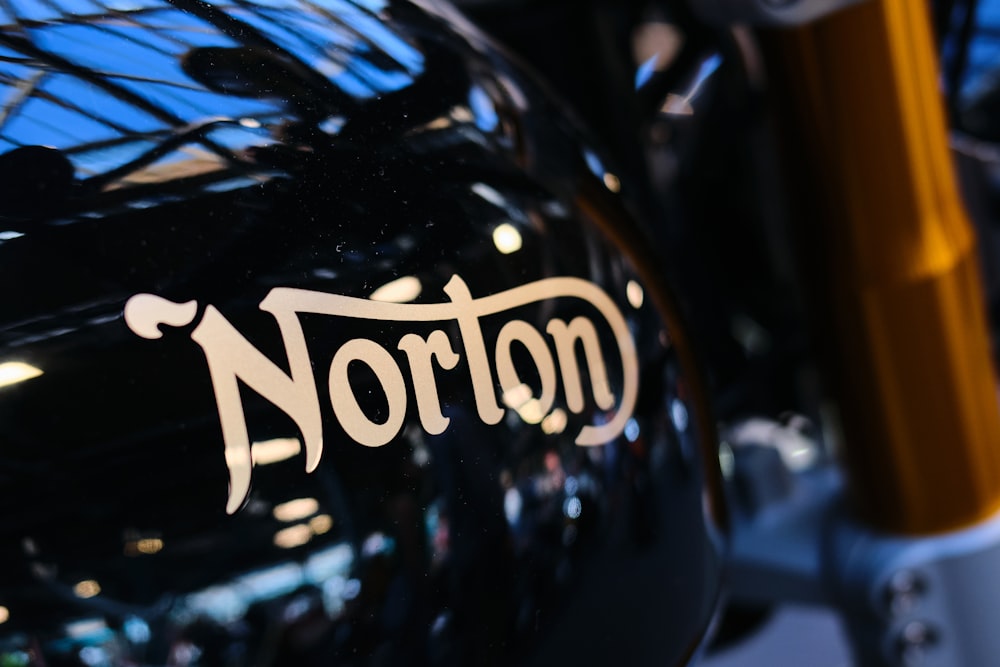 a close up of a motorcycle with a name on it