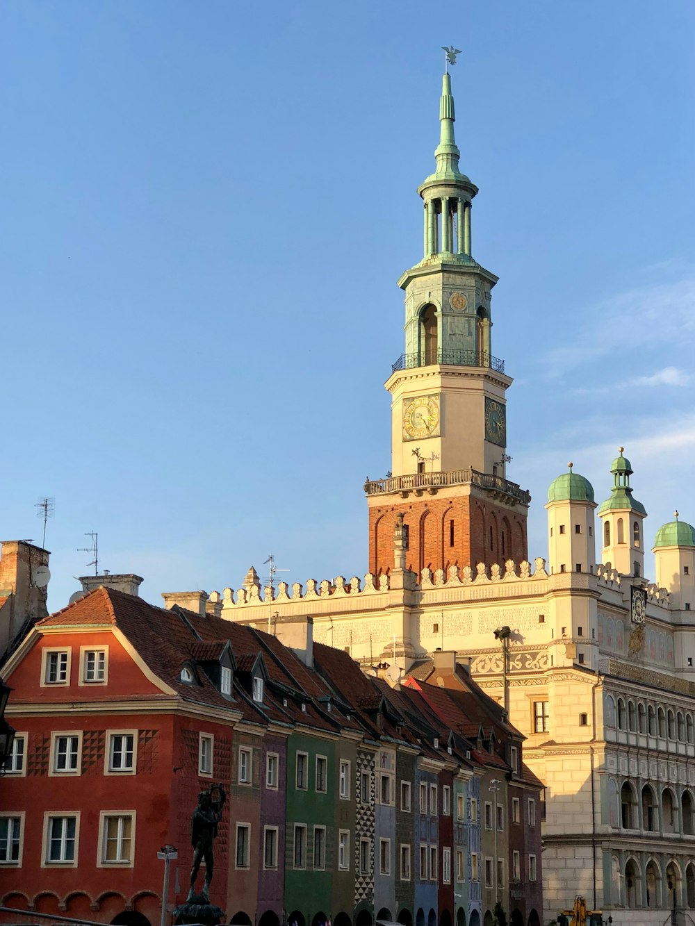 a tall building with a clock on the top of it