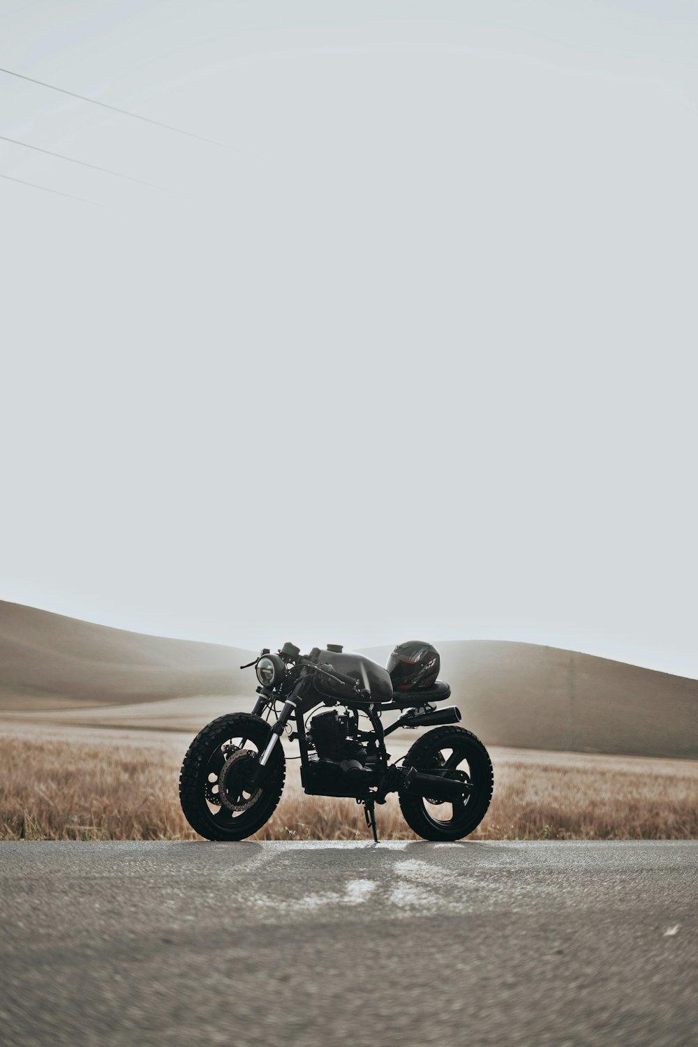 a motorcycle parked on the side of the road