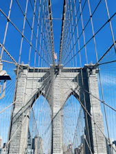 A rugged steel bridge under construction, symbolizing enduring American infrastructure.