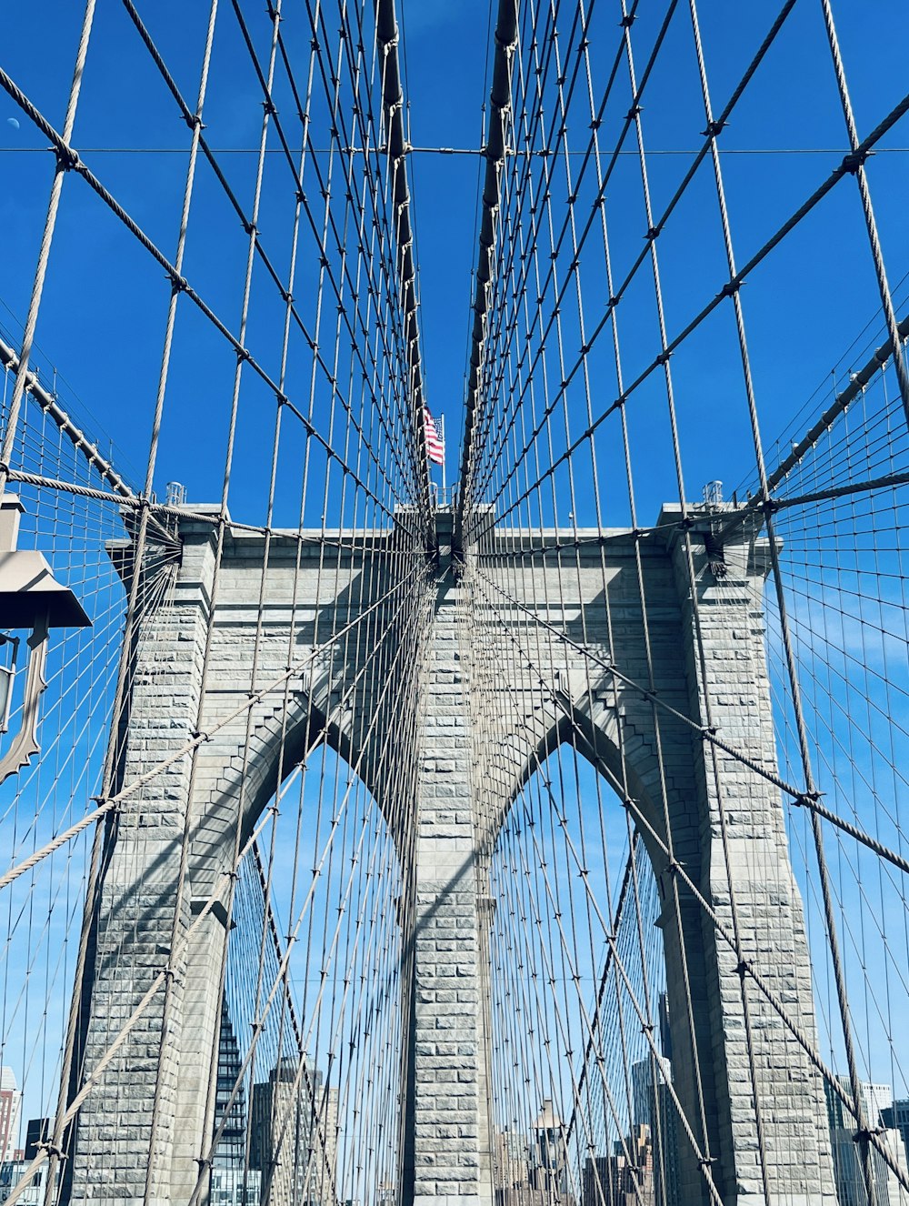 a view of the brooklyn bridge from the ground