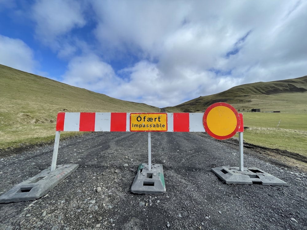 a road closed off with a sign on it