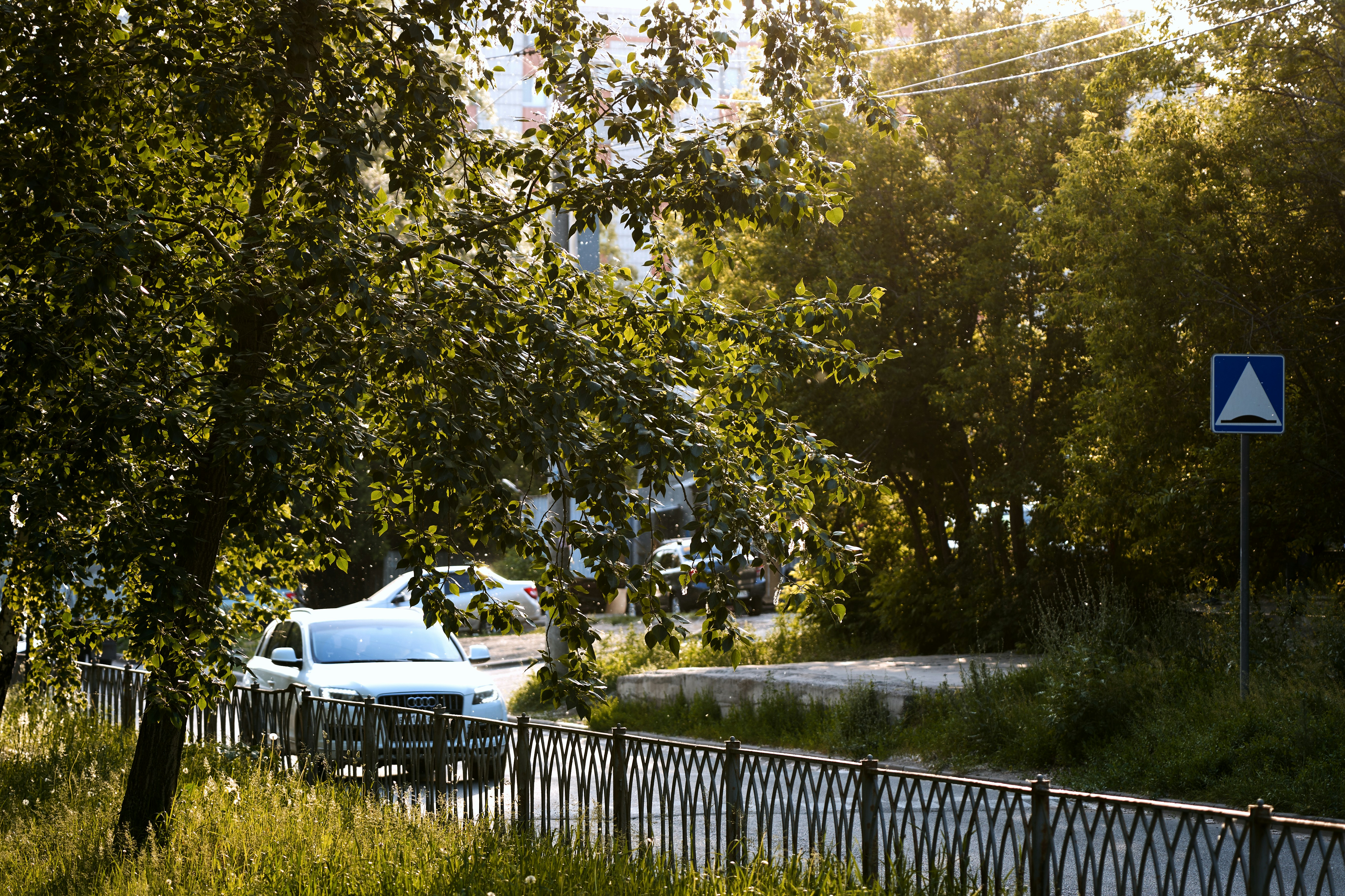 a car is parked on the side of the road
