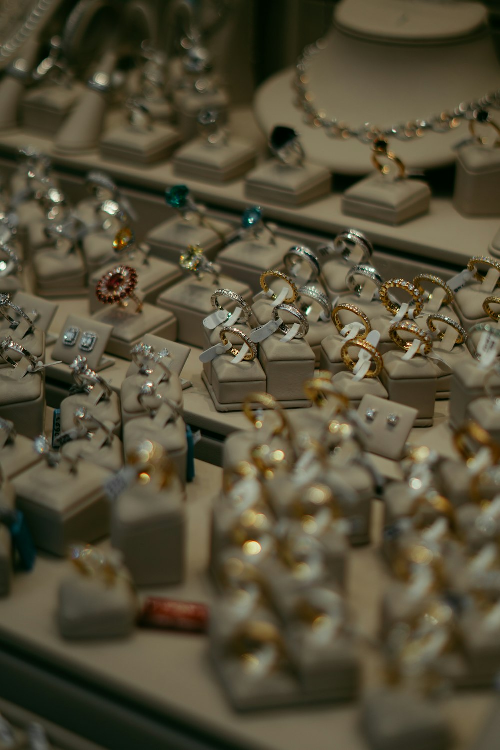 a bunch of jewelry sitting on top of a table