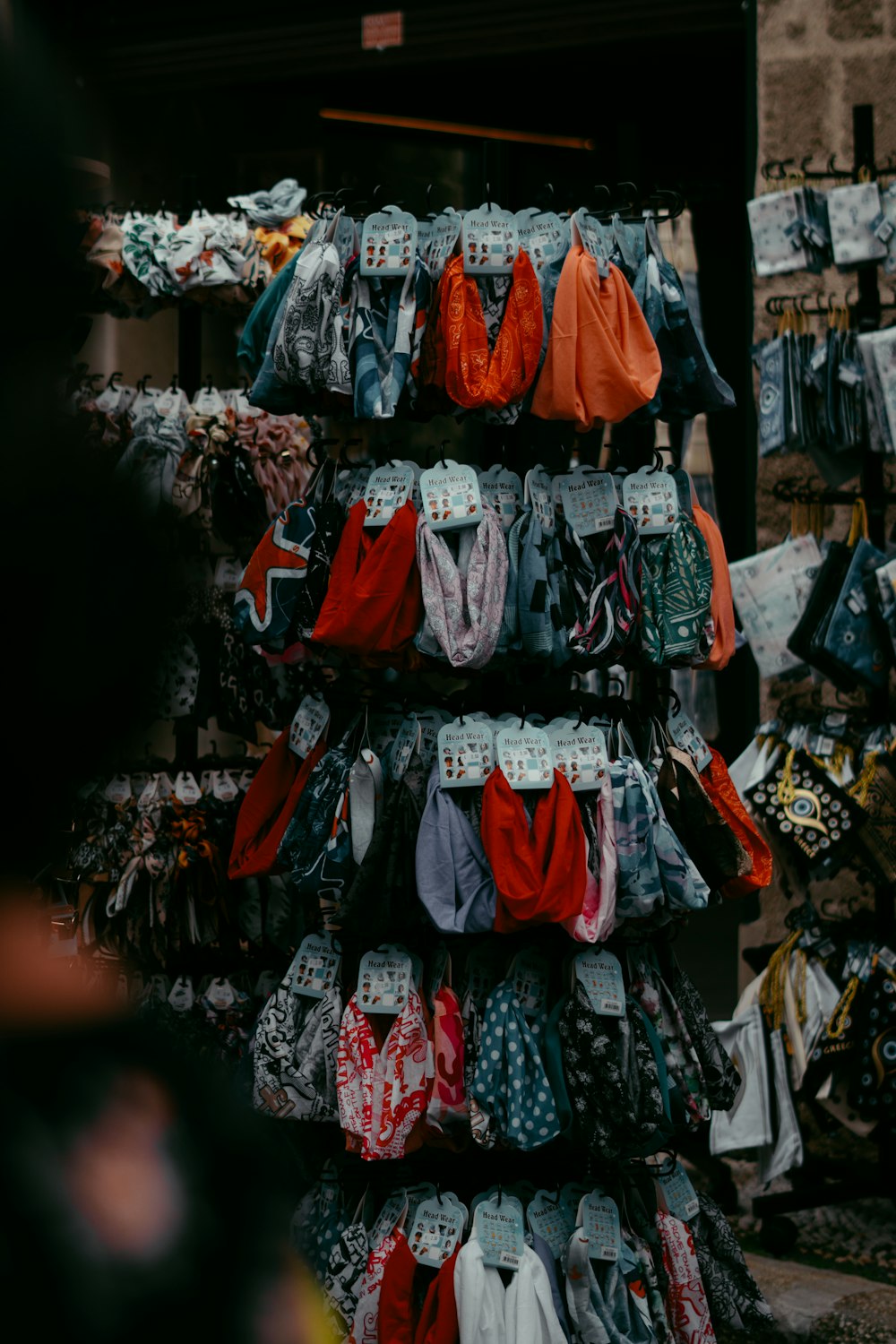 a rack of shirts and other items in a store