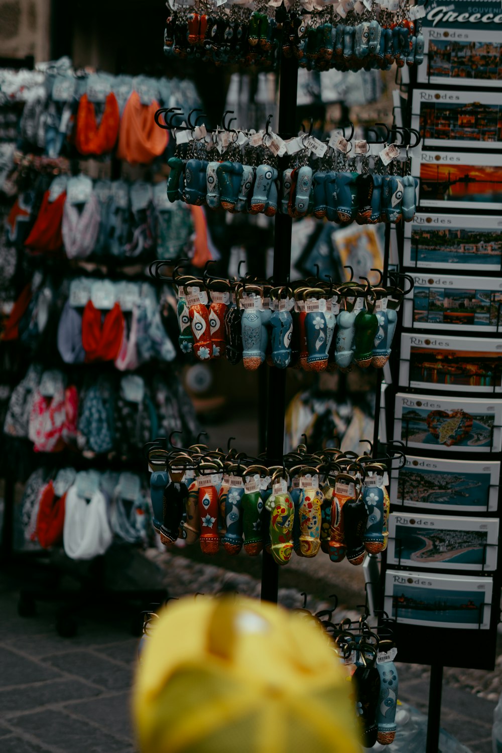 a yellow umbrella is in front of a store