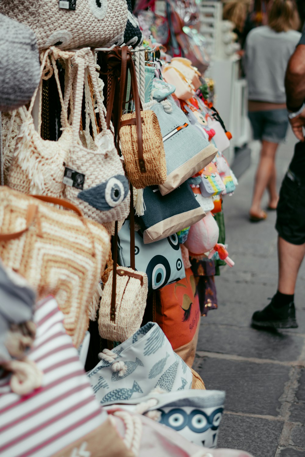 a bunch of purses that are on display