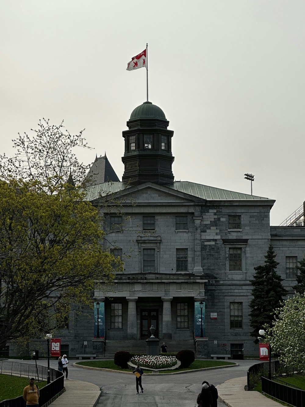 a large building with a flag on top of it