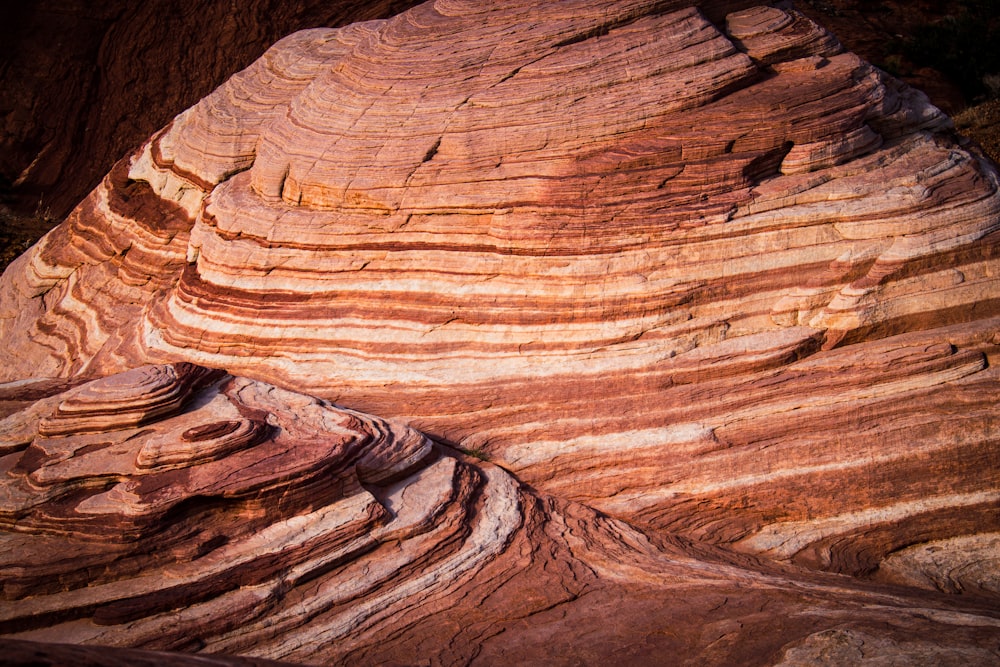 a very large rock formation in the desert