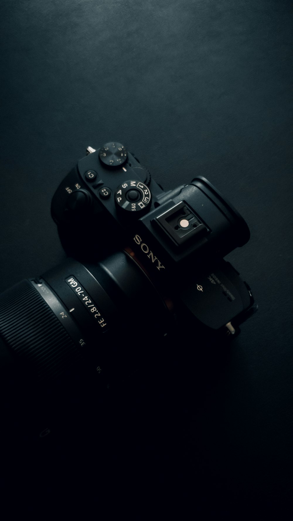 a camera sitting on top of a black table