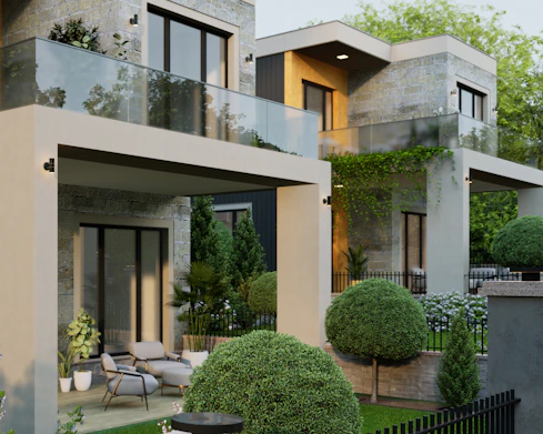 a house with a lot of trees and bushes in front of it