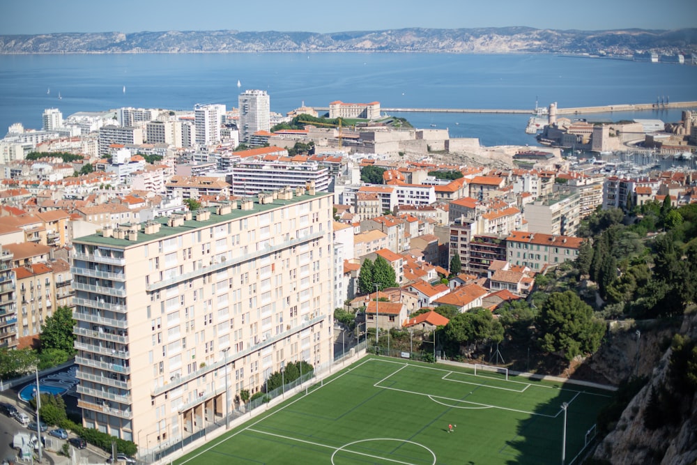 a soccer field in the middle of a city