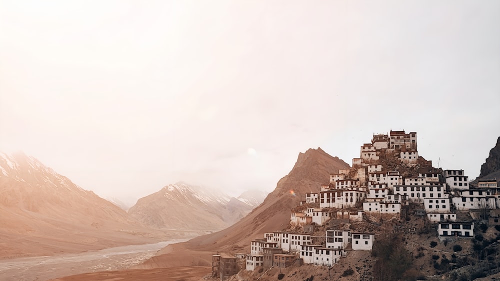 a group of buildings sitting on top of a mountain