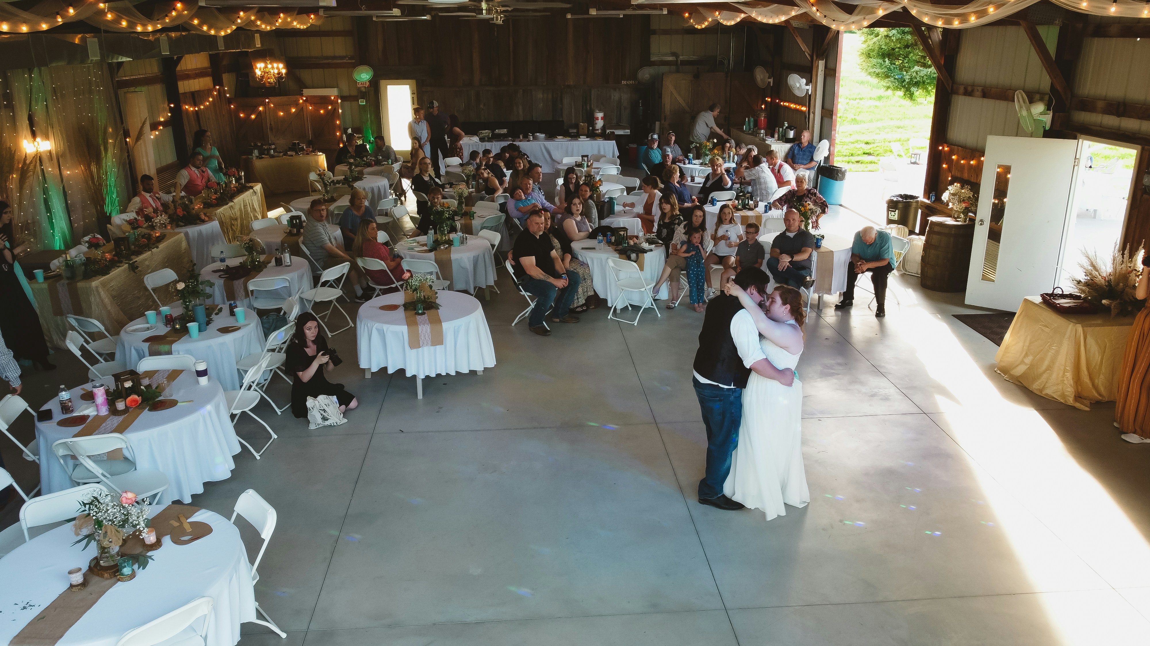 a bride and groom sharing their first dance