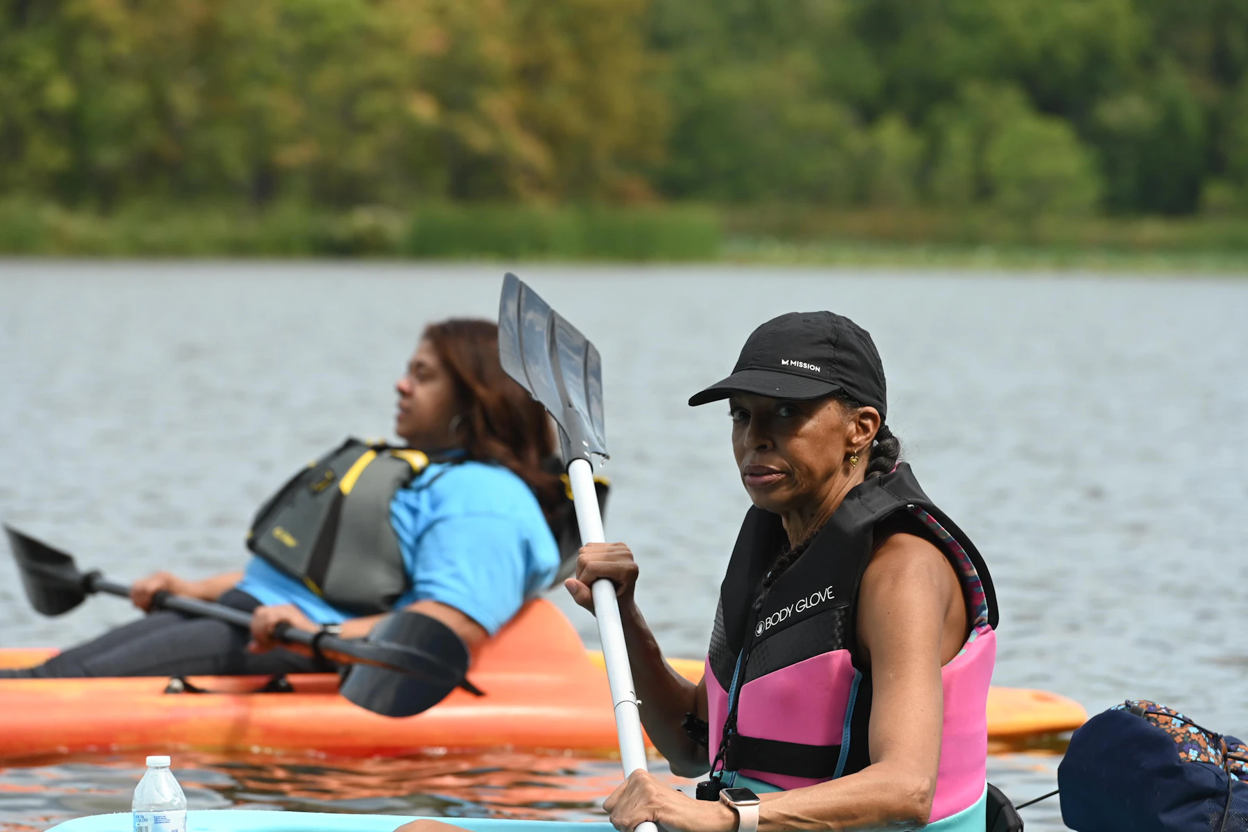Kayak adventure gear on calm water for a Seavora shoreline trip