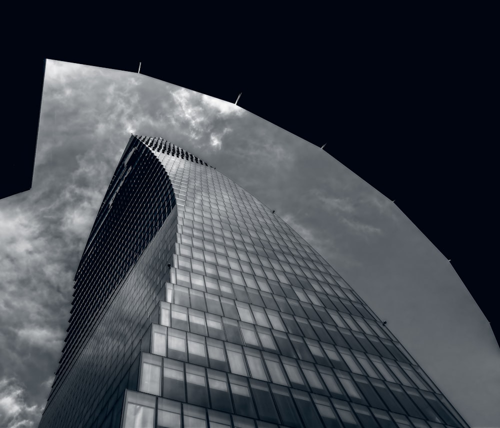 a black and white photo of a tall building