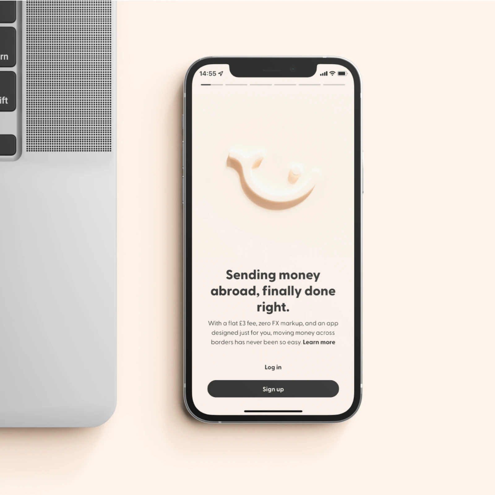 A clean, modern fintech app interface on a phone beside a laptop