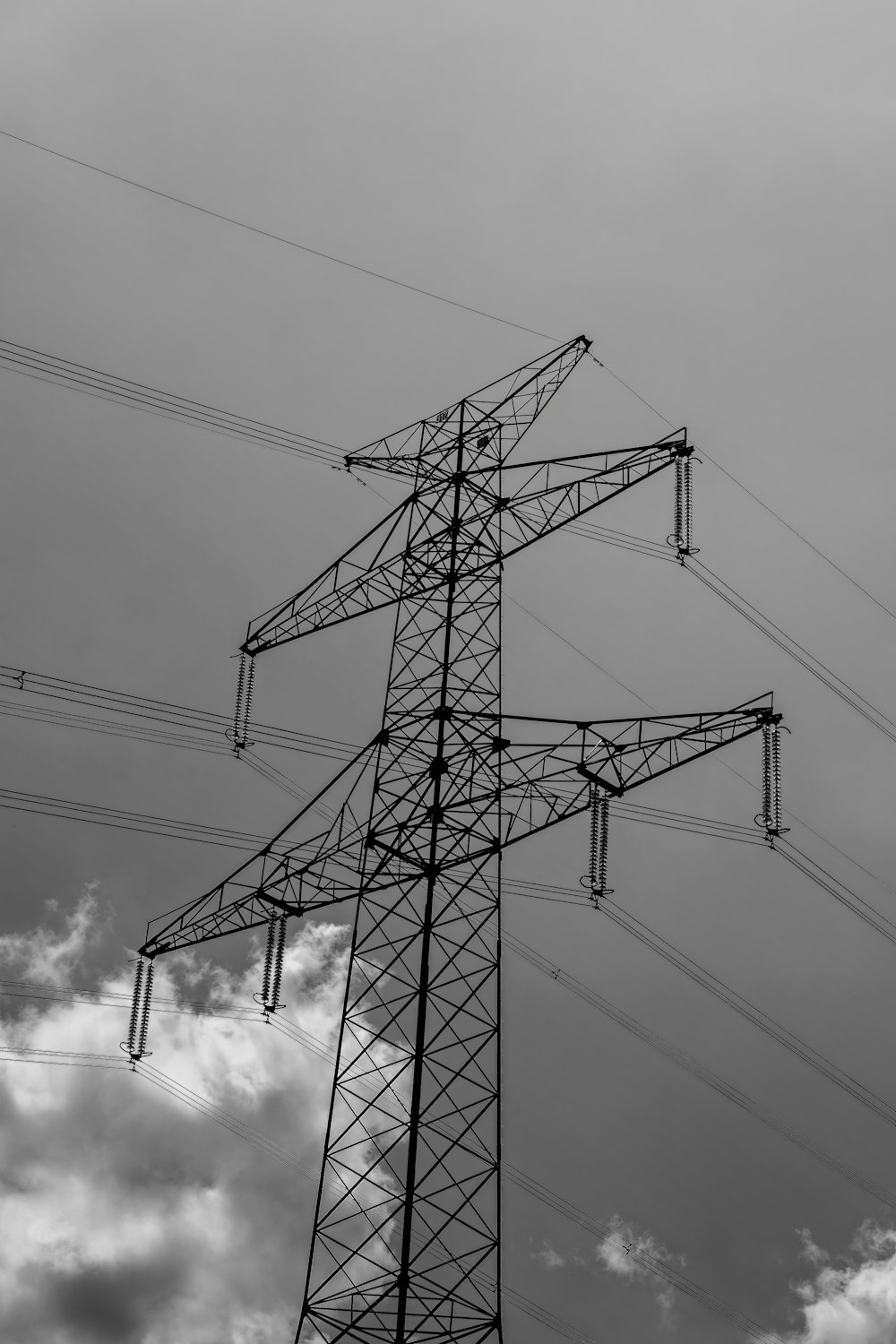 a black and white photo of power lines