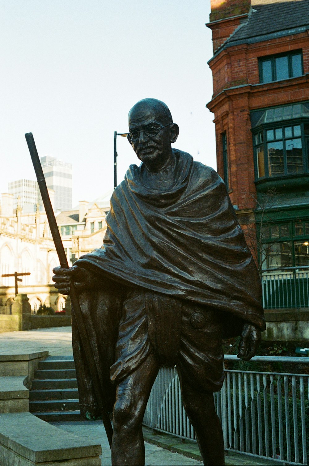 a statue of a man holding a baseball bat