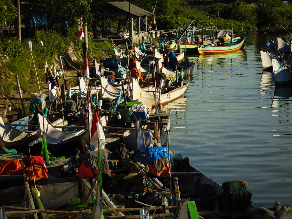 a bunch of boats that are sitting in the water