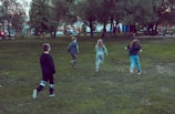 Children playing in a vibrant, eco-friendly urban park.