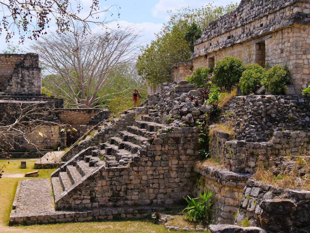 a stone structure with steps leading up to it