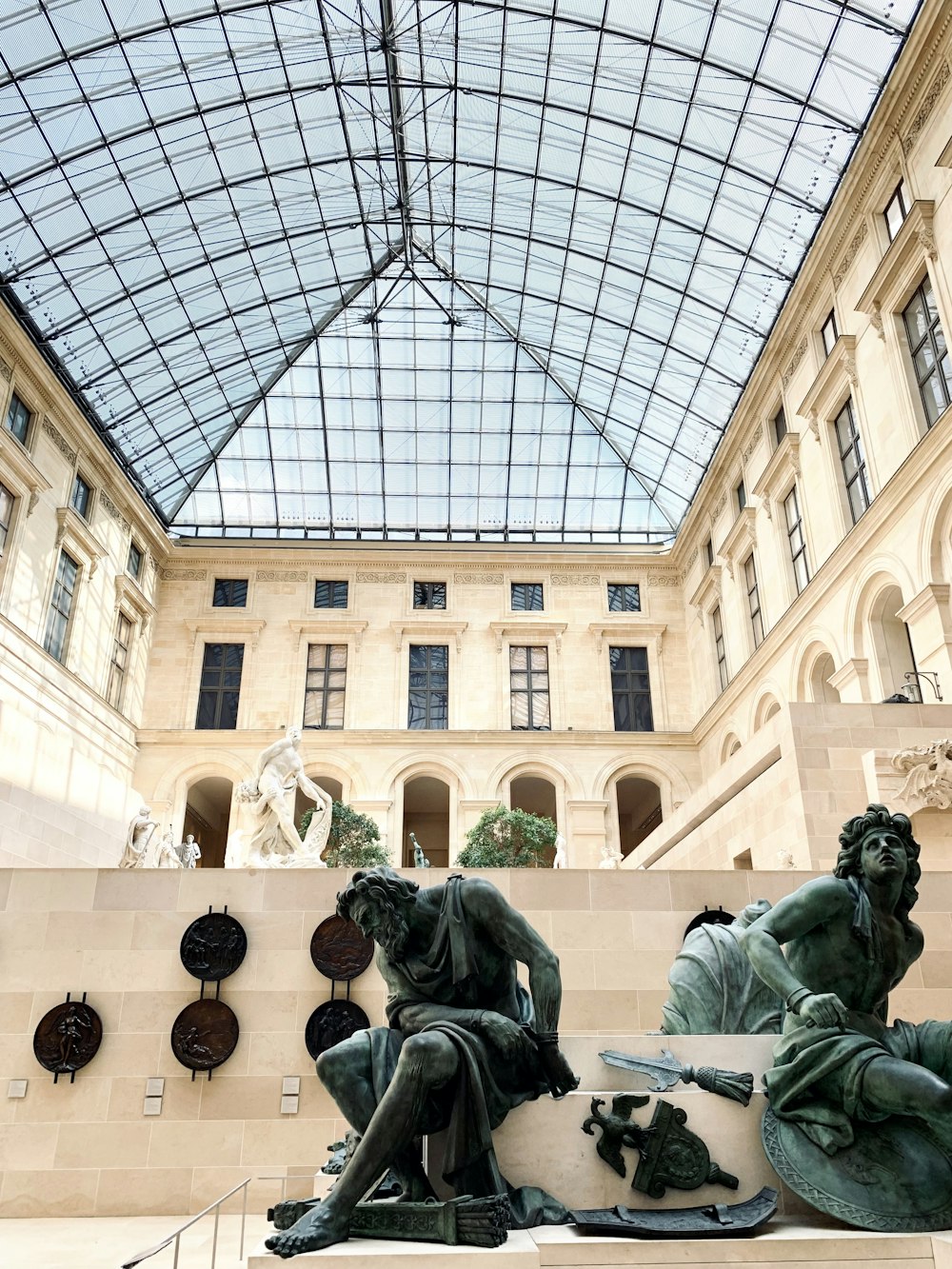 a statue of a man and a woman in a building