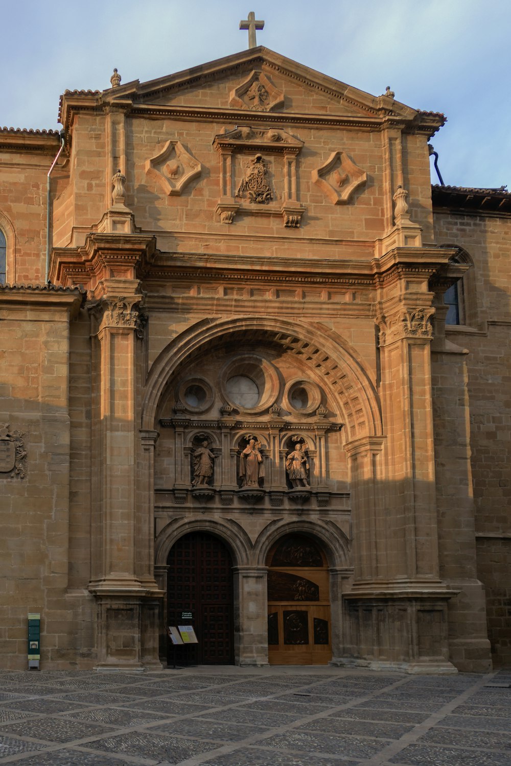 a large building with a clock on the front of it