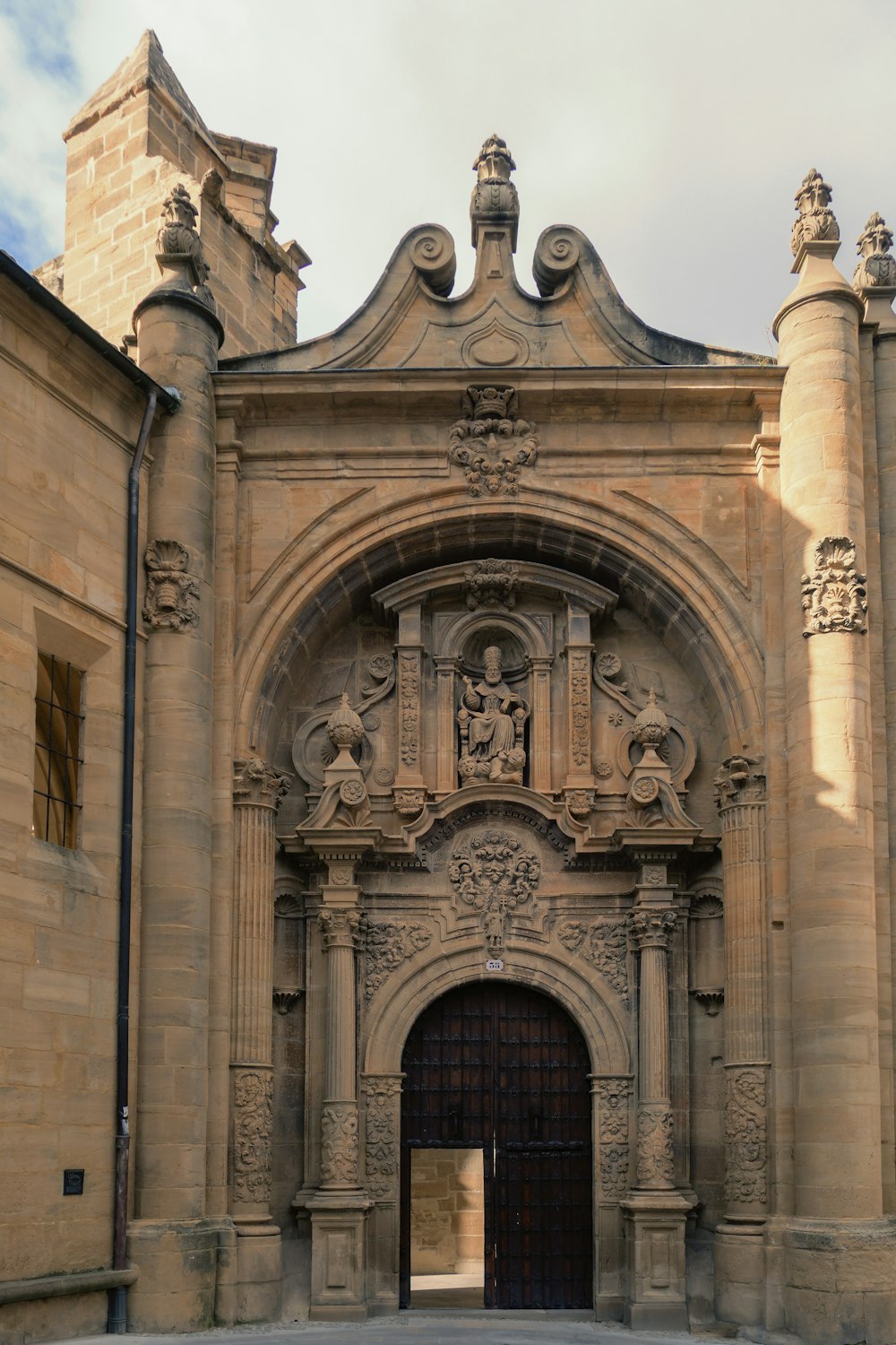 a large stone building with a massive doorway