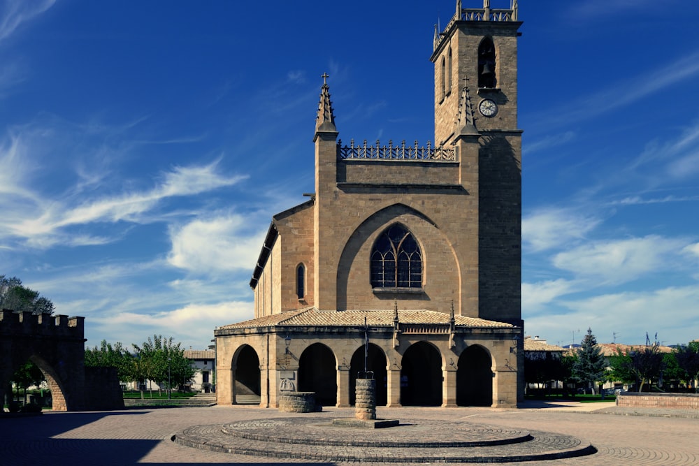 a large building with a clock on the top of it