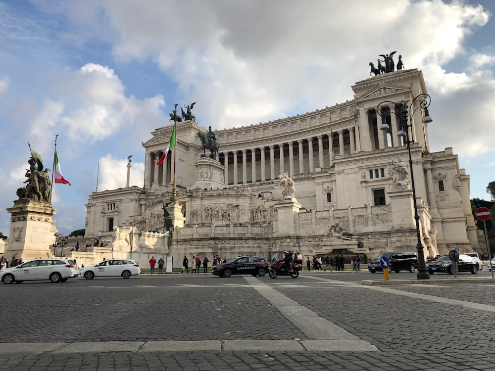 a large building with a statue on top of it