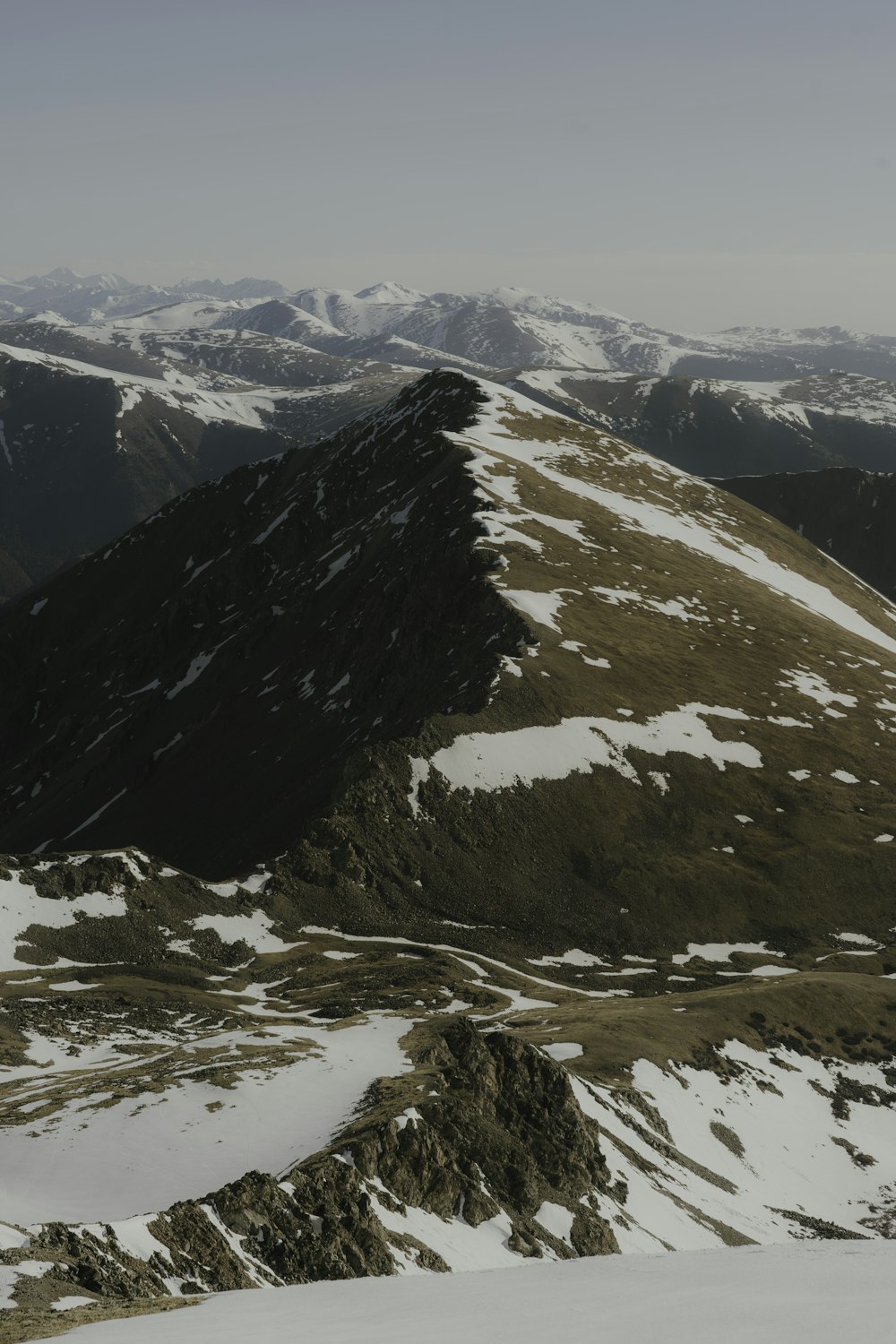 a person on skis on a snowy mountain