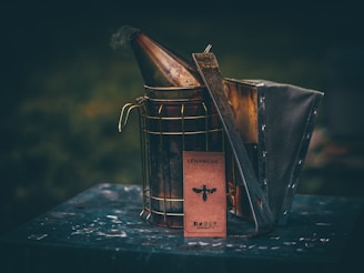 a [UNK] of wine sitting inside of a metal [UNK]