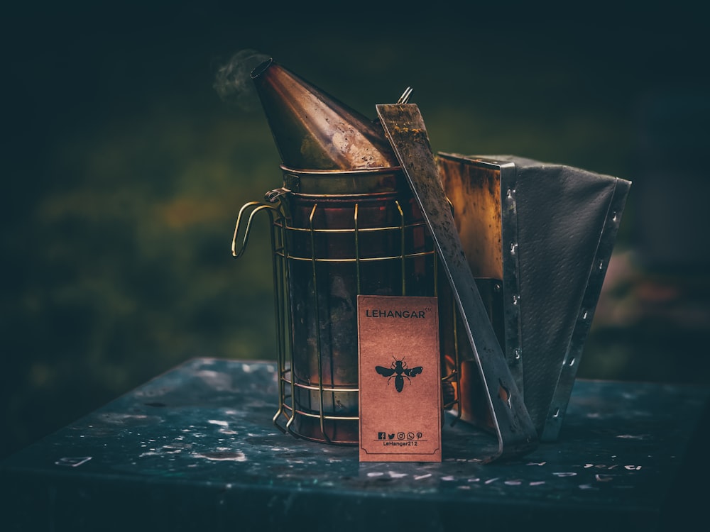 a [UNK] of wine sitting inside of a metal [UNK]