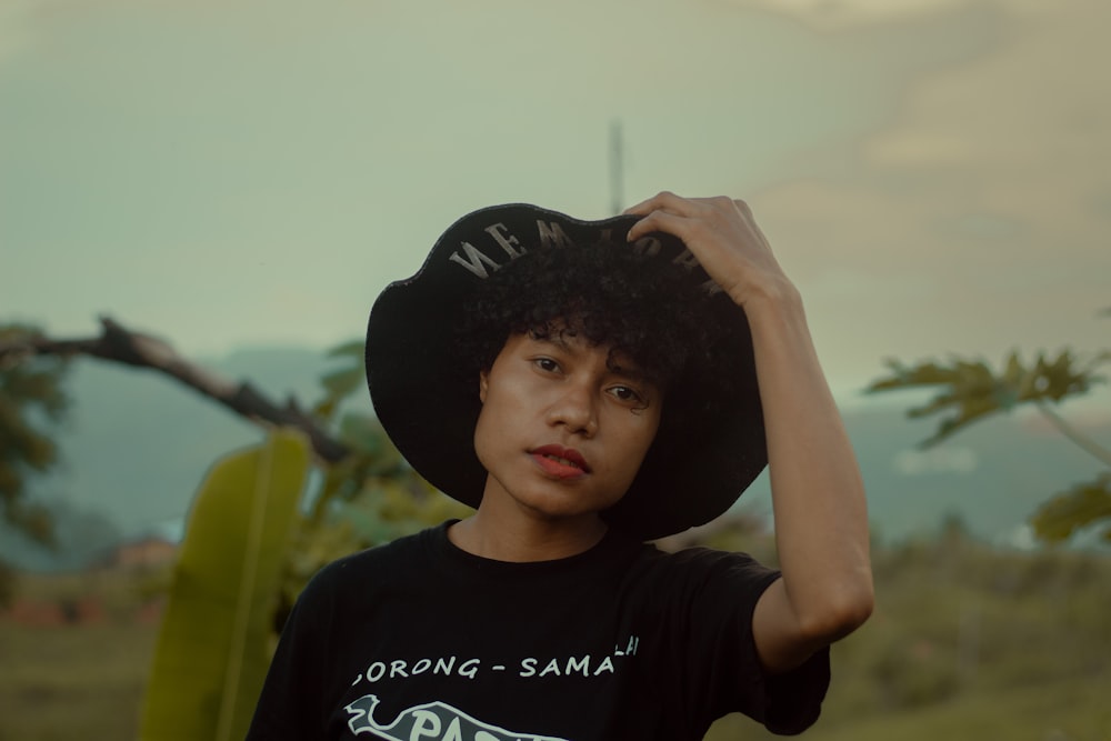 a young man wearing a black [UNK] [UNK]