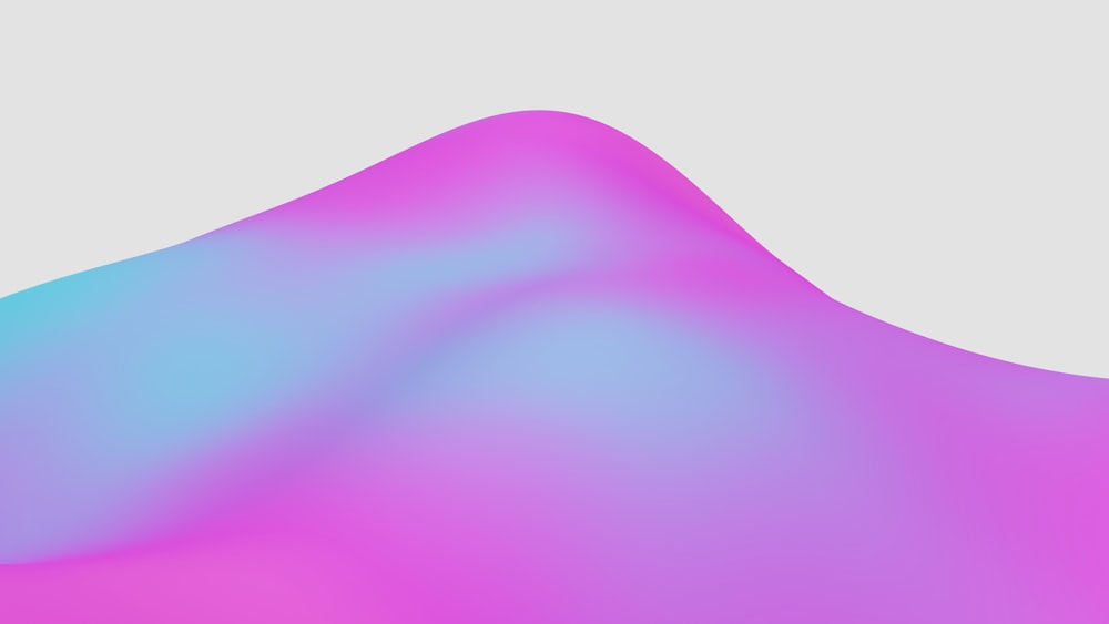 a blurry image of a pink and blue mountain