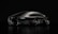 A futuristic conceptual image of a sleek car driving on a city road.