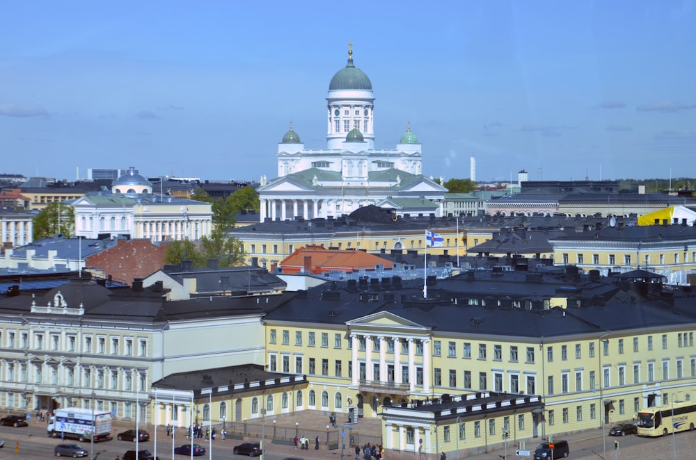 a view of a city with a large building in the background