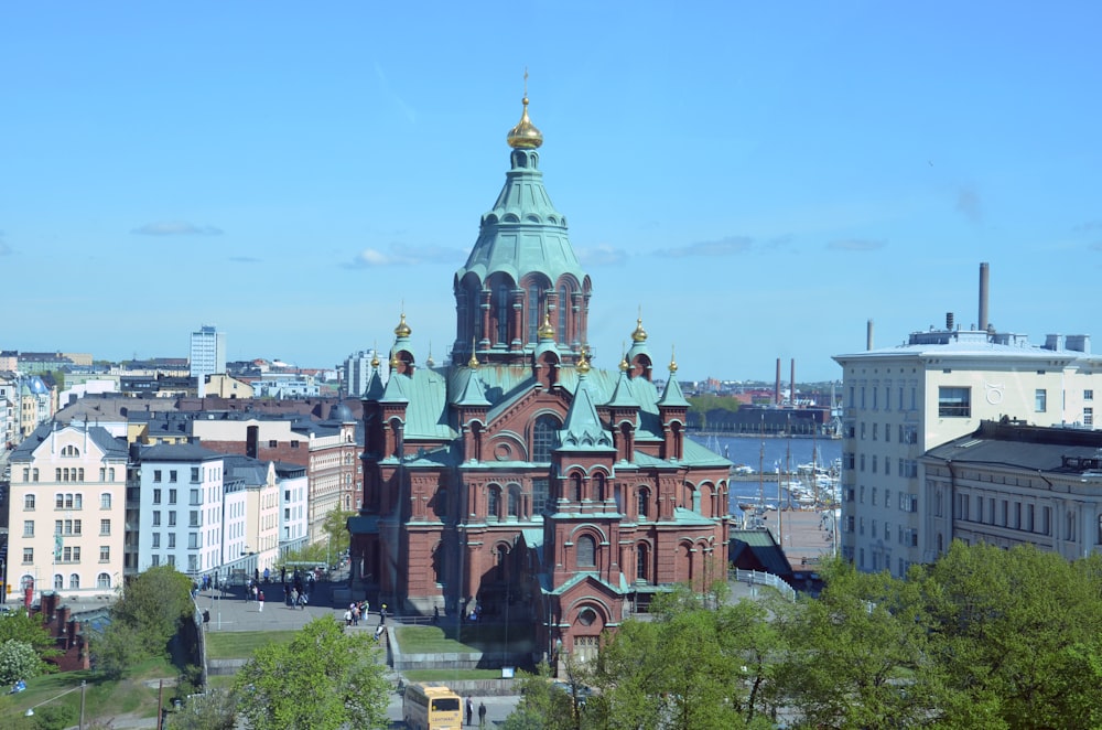 a large building with a green dome on top of it