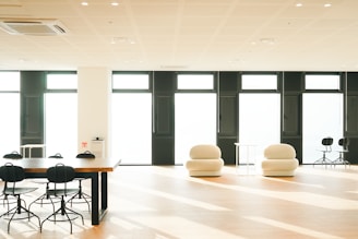 a large room with chairs and tables in it