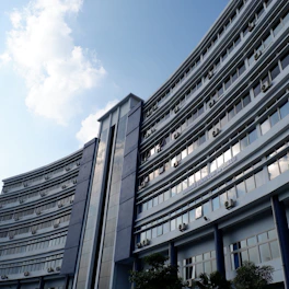 Technical drawing of a modern building HVAC system with energy analysis overlays.