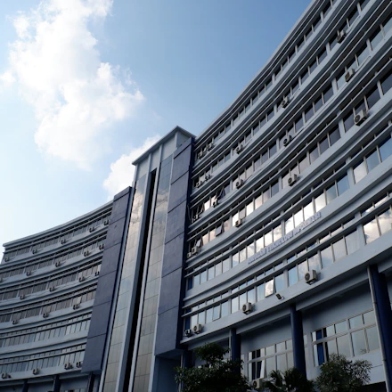 Technical drawing of a modern building HVAC system with energy analysis overlays.