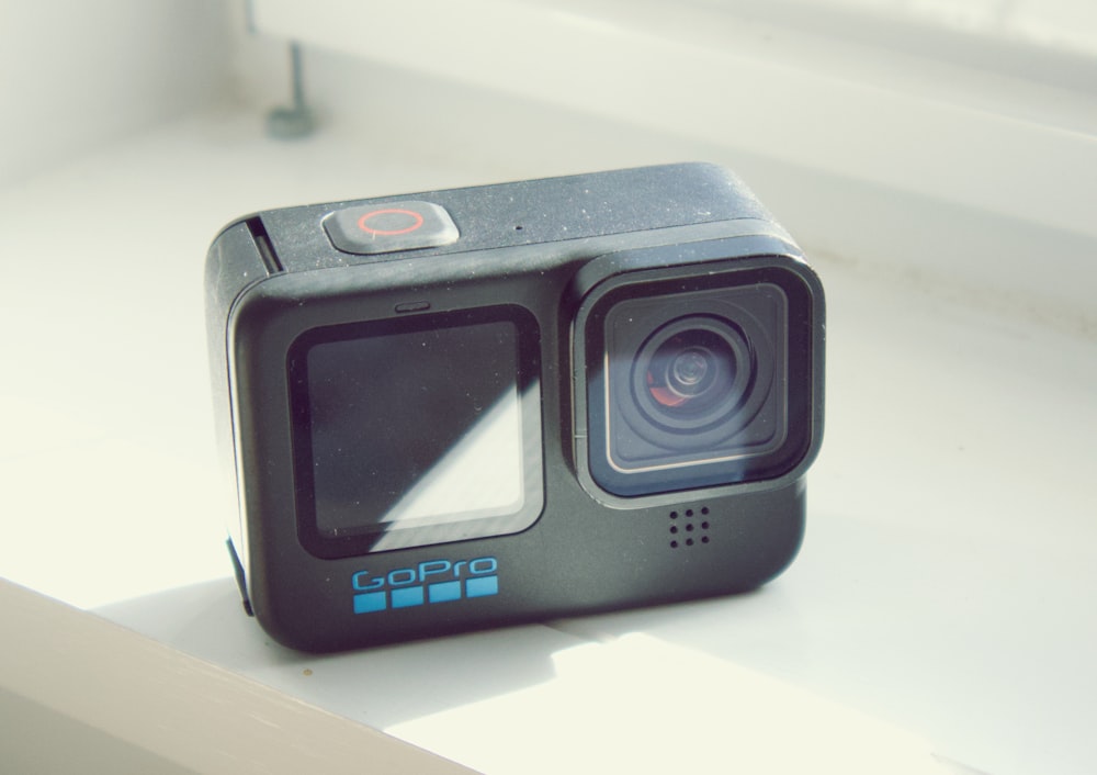 a camera sitting on top of a white table