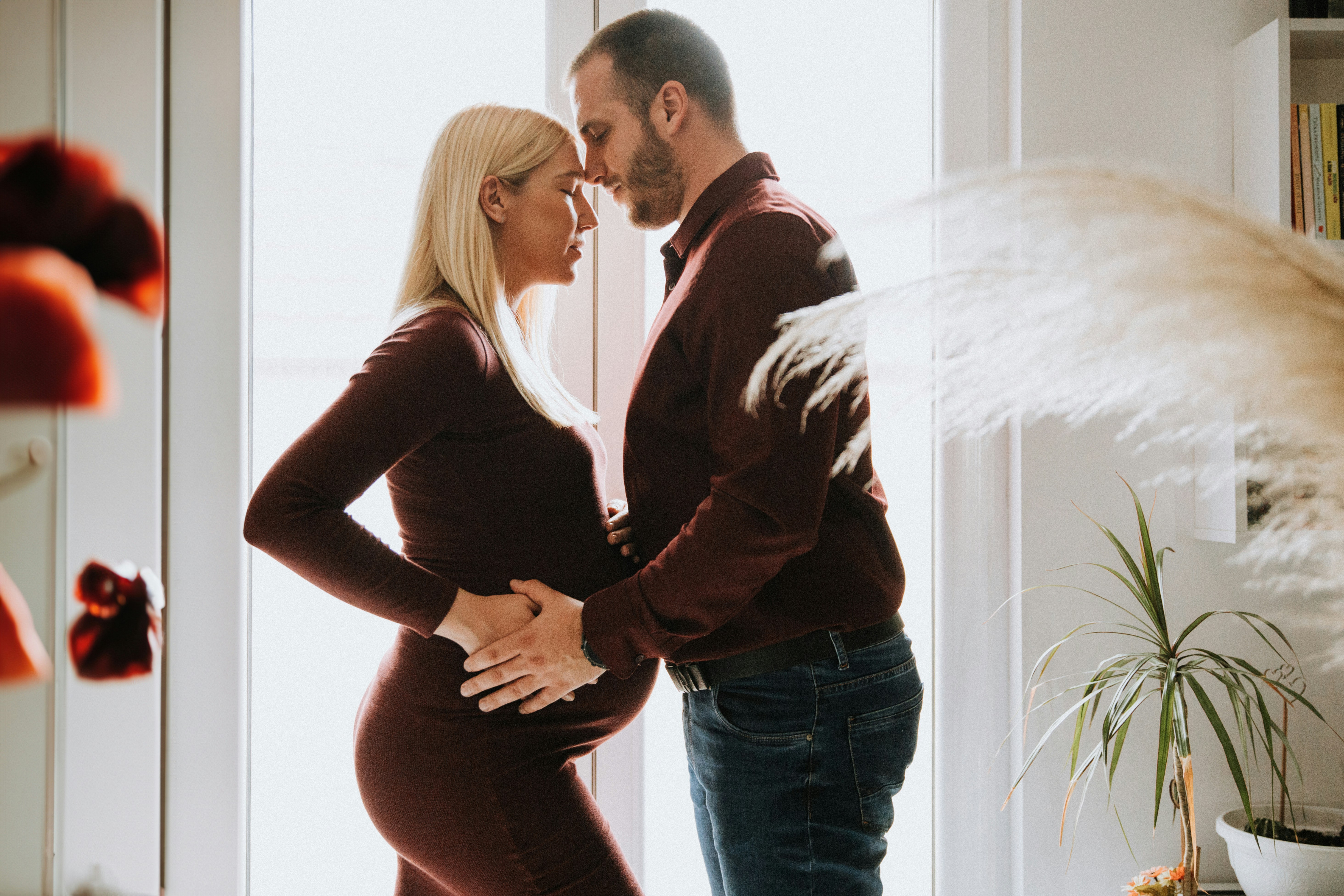 a man and woman standing next to each other