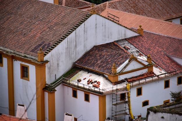 a view of a building with a lot of roof tiles