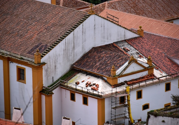 a view of a building with a lot of roof tiles